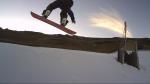 Snowboarder hitting the slopes